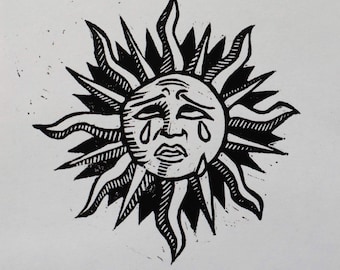 Grabado en linóleo de un sol lloroso medieval