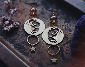 aura. bohemian celestial sun moon and star earrings with golden quartz gemstones