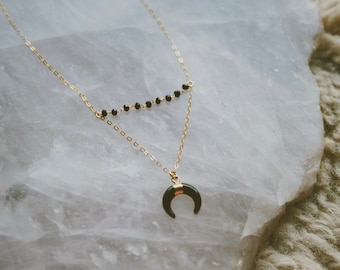 volcanic moon. a boho black obsidian double horn moon dainty onyx beaded necklace