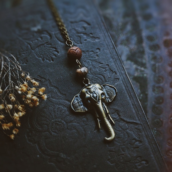 pachyderm. a bohemian elephant, carved lotus and jasper necklace