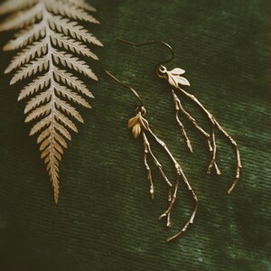 golden boughs. a pair of earthy, nature inspired tree branch and leaf earrings