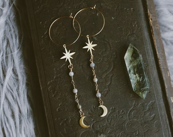 oceans of stars. a pair of gold celestial labradorite, moon, and star hoop earrings