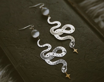 selenite serpent. a pair of bohemian gemstone and celestial snake mixed metal statement earrings