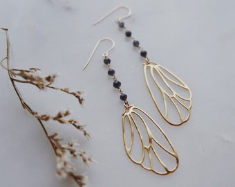 sapphira. a pair of sapphire and golden butterfly wing bohemian earrings