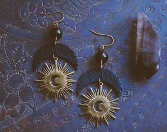 dream within a dream. a pair of mixed metal boho celestial smoky quartz black crescent moon gold brass sun earrings