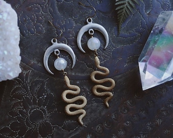 lunar serpent. a pair of bohemian mixed metal moon, aura quartz and snake celestial boho earrings