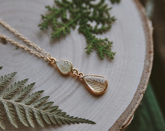 changing seasons. a dainty carved green aventurine and citrine gemstone leaf gold filled necklace