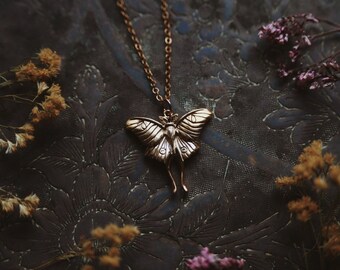 golden luna. a bronze luna moth nature inspired necklace