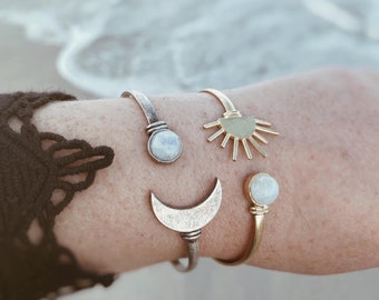 celestial glow. a bohemian rainbow moonstone celestial moon or sun adjustable cuff bracelet in gold or silver