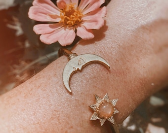 luminous. a boho celestial sunstone sun and moon adjustable brass cuff bracelet