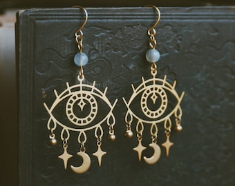 cosmic vision. a pair of dreamy boho celestial eye, moon, star and labradorite earrings