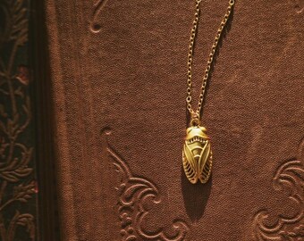 summer relic. a golden victorian inspired cicada insect necklace.
