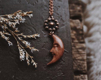 amaris. a bohemian carved wood moon and copper necklace