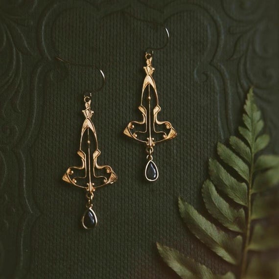 maude. a pair of bohemian art nouveau vintage filigree charms and black cubic zirconia teardrop earrings