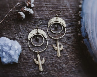 desert wanderer. a pair of bohemian cactus moon hoop textured brass earrings