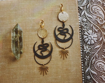 shadow serpent. a pair of bohemian mixed metal black snake earrings