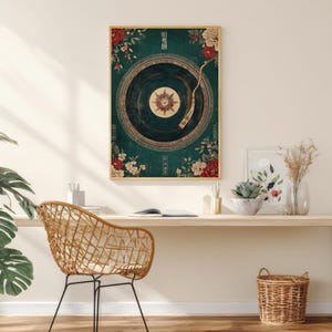 May include: A framed art print featuring a vintage record player design with floral accents in red and white against a teal background. The artwork includes Chinese characters and is set in a gold frame.