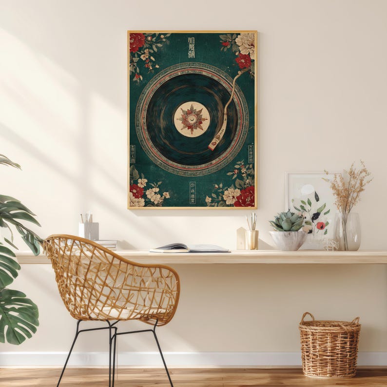 May include: A framed art print featuring a vintage record player design with floral accents in red and white against a teal background. The artwork includes Chinese characters and is set in a gold frame.