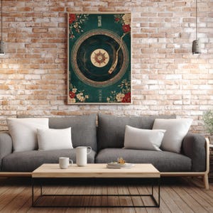 May include: A framed wall art print featuring a vintage record player design. The artwork has a teal background with floral accents in red and cream. The record player's needle is positioned on the record. The print is displayed above a gray sofa and wooden coffee table.