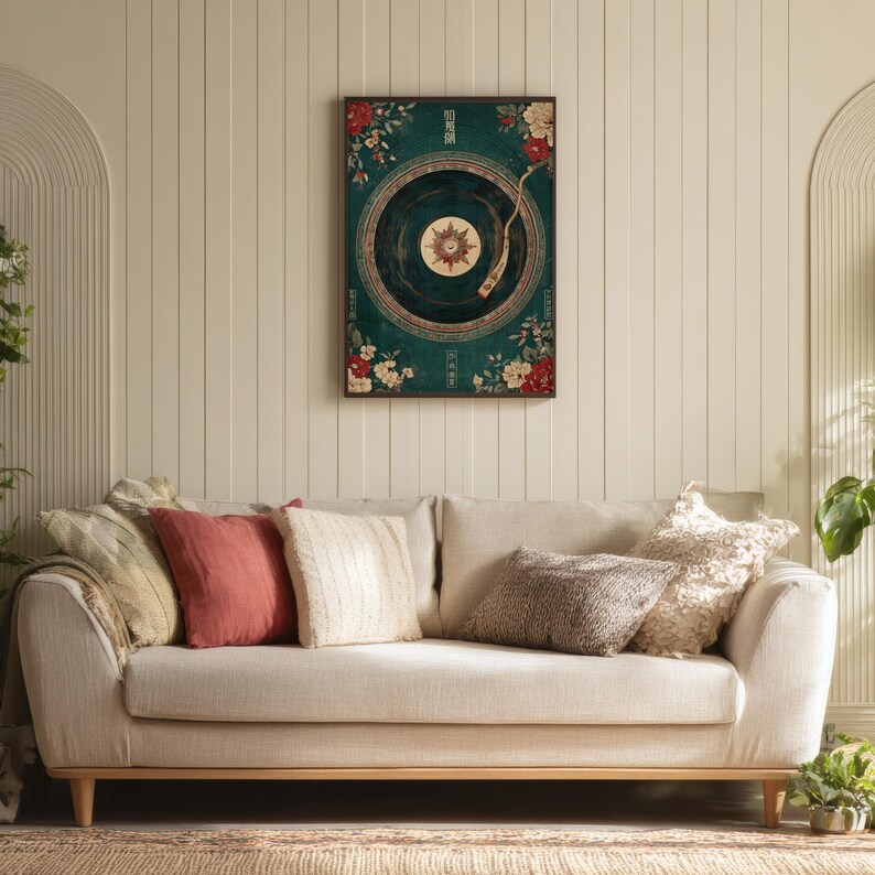 May include: A framed wall art print featuring a vintage record player design with a teal background and floral accents. The artwork is displayed above a beige sofa with various throw pillows. The room has a neutral color palette.