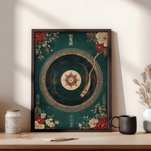 May include: Framed art print featuring a vintage-style record player design with floral accents in red and white against a teal background. The print includes Japanese text and is displayed on a wooden surface.