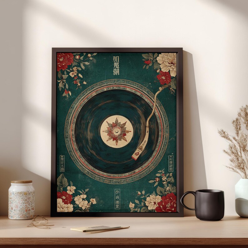 May include: Framed art print featuring a vintage-style record player design with floral accents in red and white against a teal background. The print includes Japanese text and is displayed on a wooden surface.