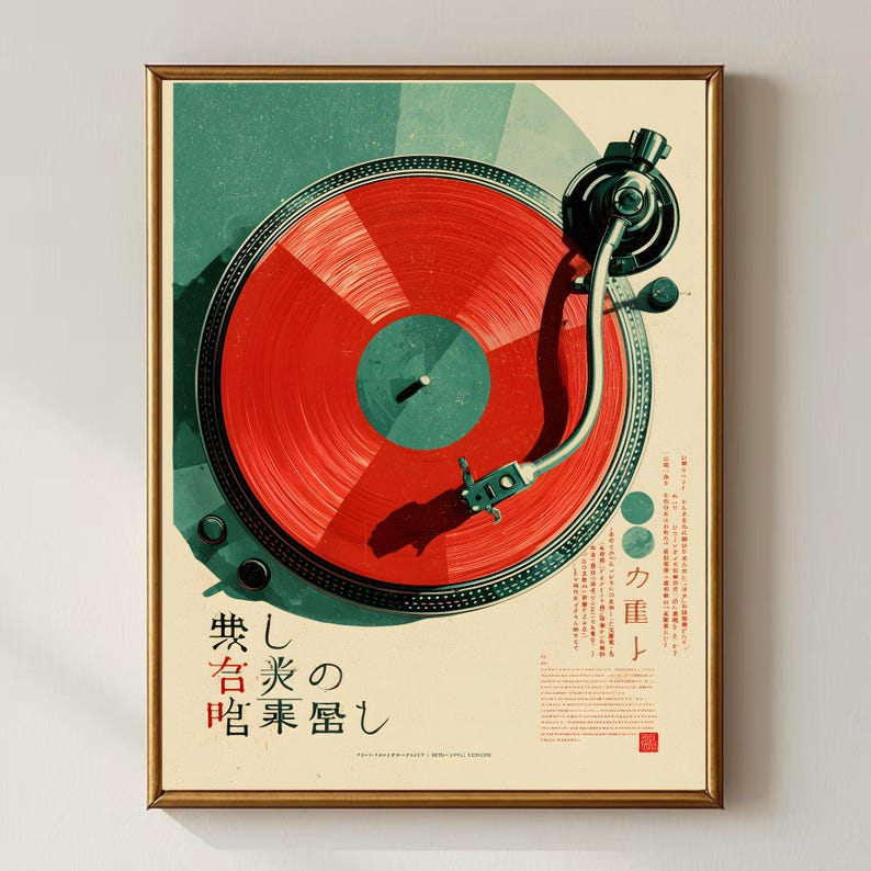 May include: A framed poster featuring a top-down view of a turntable with a vibrant red vinyl record. The design includes a teal background, a black tonearm, and Japanese text printed in black and red. The overall aesthetic is graphic and illustrative.