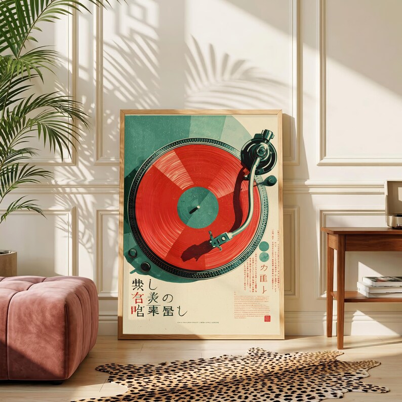 May include: A rectangular wall art print featuring a top-down view of a vintage turntable with a vibrant red vinyl record. The design includes dark green accents, a silver tone arm, and Japanese text characters printed in black and red ink.