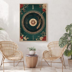 May include: A framed art print featuring a vintage-style record player design. The artwork has a teal background with floral accents in red and cream. The record player's needle is positioned over the center of the record. The print is displayed in a light-colored wooden frame.