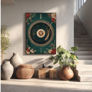 May include: A framed wall art print featuring a vintage-style record player design. The artwork has a teal background with floral accents in red and white. The record player's needle is positioned over the record. The print has Chinese characters.