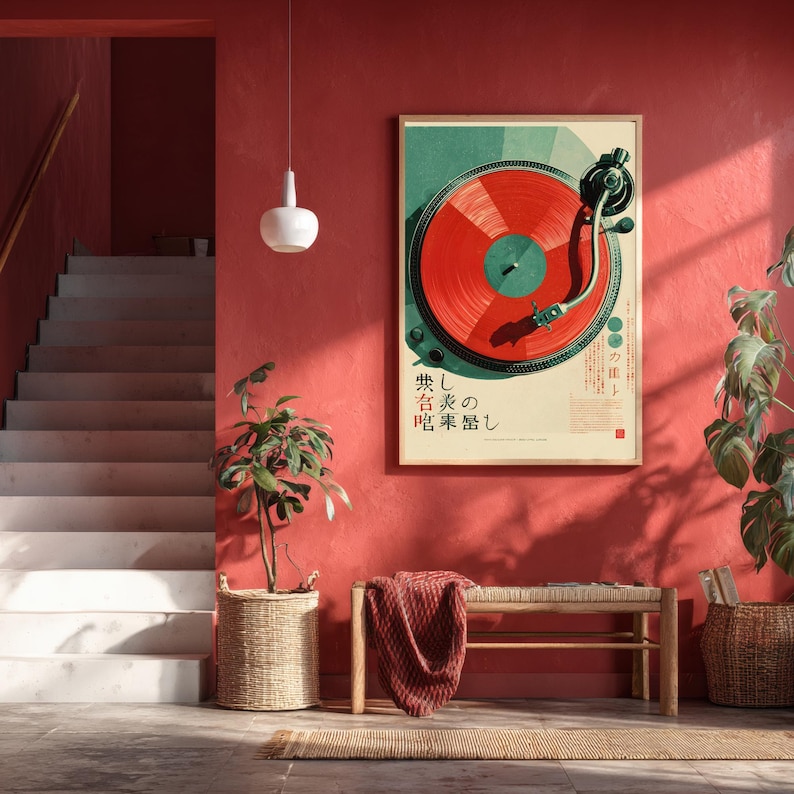 May include: A rectangular wall art print featuring a top-down view of a turntable with a vibrant red vinyl record. The design includes dark green accents and Japanese text characters. The print is framed in a light wood frame and displayed on a red wall.