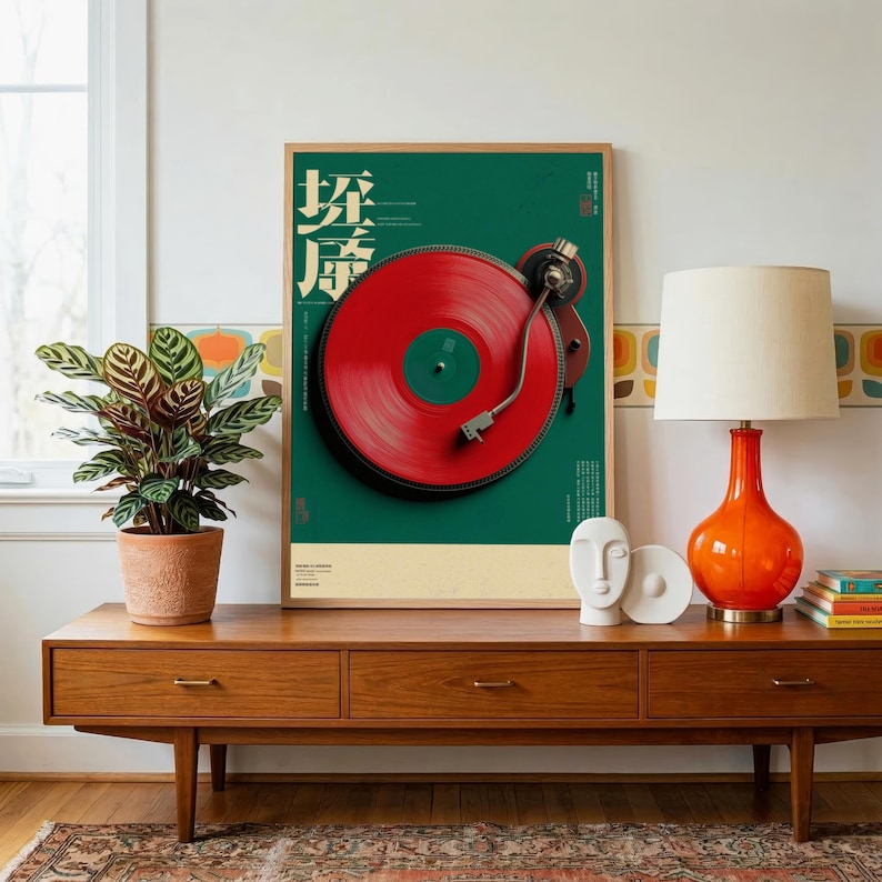 May include: A framed wall art print featuring a graphic illustration of a red vinyl record on a turntable against a deep green background, with white Chinese characters and text elements arranged vertically and horizontally on the poster.