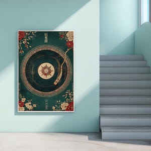 May include: A framed art print featuring a vintage record player design with floral accents. The artwork has a teal background with red and white flowers. The record player's center has a starburst design.