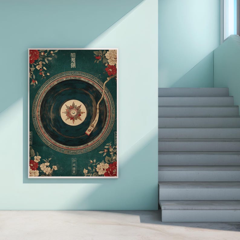 May include: A framed art print featuring a vintage record player design with floral accents. The artwork has a teal background with red and white flowers. The record player's center has a starburst design.