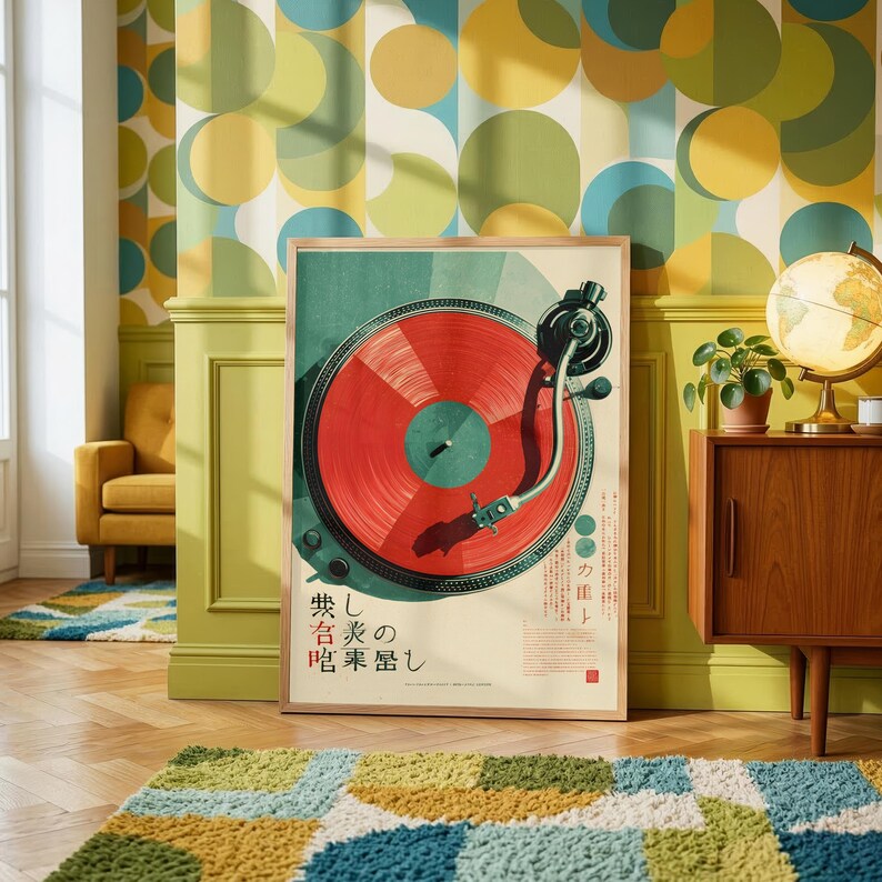 May include: A rectangular poster featuring a graphic illustration of a turntable with a vibrant red vinyl record. The design includes a black tonearm and Japanese text characters printed in black on a light cream background, presented in a thin frame.