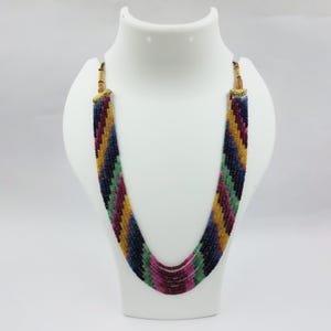 Rainbow Gemstone Necklace: Eight-Row Sapphire, Emerald, and Longo Tongo