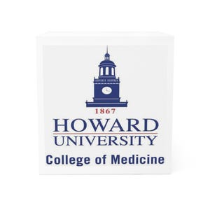 May include: A white box featuring the Howard University logo. The logo includes a blue illustration of a building with a clock tower, the text "HOWARD UNIVERSITY" in blue, and "College of Medicine" in blue.