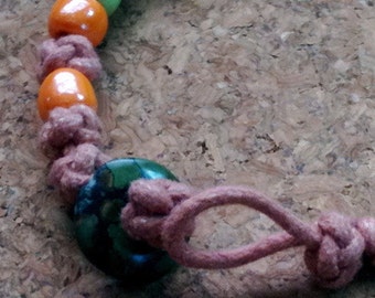 Bracelet of Knotted Cotton Cord With Glass Beads and Turquoise Fastener