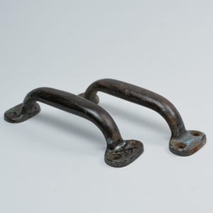 1930 paar grote gietijzeren handgrepen / ladegrepen