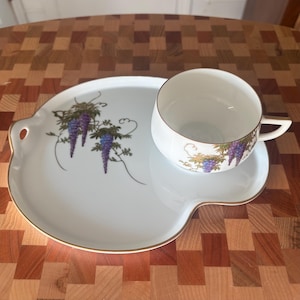 May include: A rustic wooden sign with the text "Welcome to our home" in white lettering. The sign features a distressed finish and a simple, inviting design, perfect for a front porch or entryway.