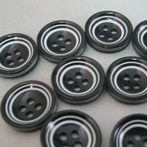 Black and White button. Lot is 6 buttons. 4 hole  2 sizes  1/2&quot; (12.8mm) .