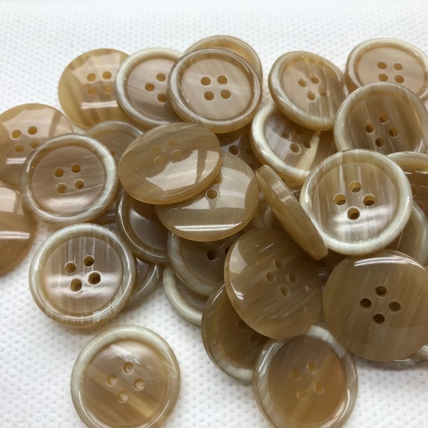 Tan button with blended white rim. brown shiny rim 4 hole