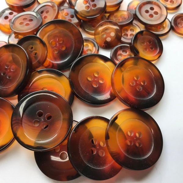 Orange buttons, Three sizes available 7/8"(22mm),  5/8" (15mm),  1/2"(13mm)  Lot size is 6 buttons,  Flat rim round back.