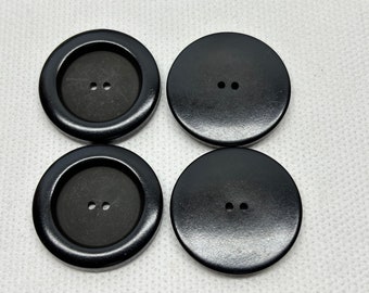 Large Satin Black buttons shiny rim  Lot of 4  Buttons 2 hole. Buttons as shown in picture  beautiful-  1- 5/16"  (34.2mm across) .