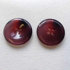 Purple buttons, Four sizes available 7/8&quot;3/4&quot; 5/8&quot; 1/2&quot; (pick size). Lot size is 6 buttons, Beautiful Purple and clear buttons.