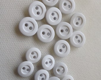 Rubber Buttons -  White - 2 Sizes 9/16" and 7/16"  - Lot size is 6 Buttons. Rugby buttons.