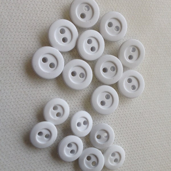 Rubber Buttons -  White - 2 Sizes 9/16" and 7/16"  - Lot size is 6 Buttons. Rugby buttons.