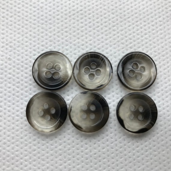 Gray Clear Buttons, One Size Available 5/8 15mm, Lot Size is 6 Buttons,  Flat Rim With Recessed Center Round Back. 