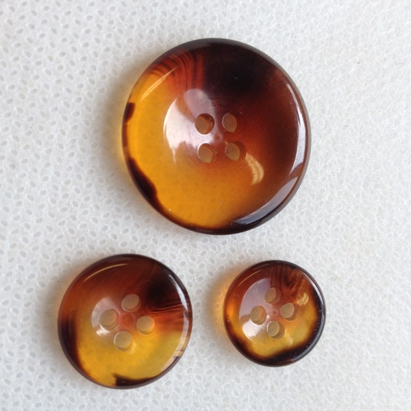 Orange buttons, Three sizes available 7/8" 5/8" 1/2" (pick size). Lot size is 6 buttons, Beautiful Orange and clear buttons.