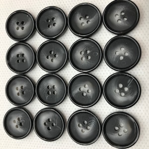 Black  button white  mottled center 13/16&quot; diameter, shiny rim dull center  button  4 hole round back Lot of 6  buttons.